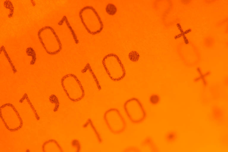 obscuring an orange background with figures